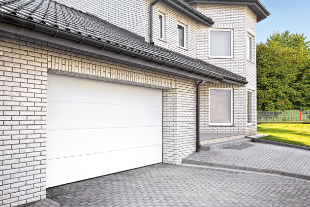 Automatick&aacute; gar&aacute;žov&aacute; vrata Solid Pro, sekčn&iacute; typ otev&iacute;r&aacute;n&iacute;, lamela s&nbsp;termoizolačn&iacute; v&yacute;pln&iacute;, sp&iacute;nač proti přet&iacute;žen&iacute;, 